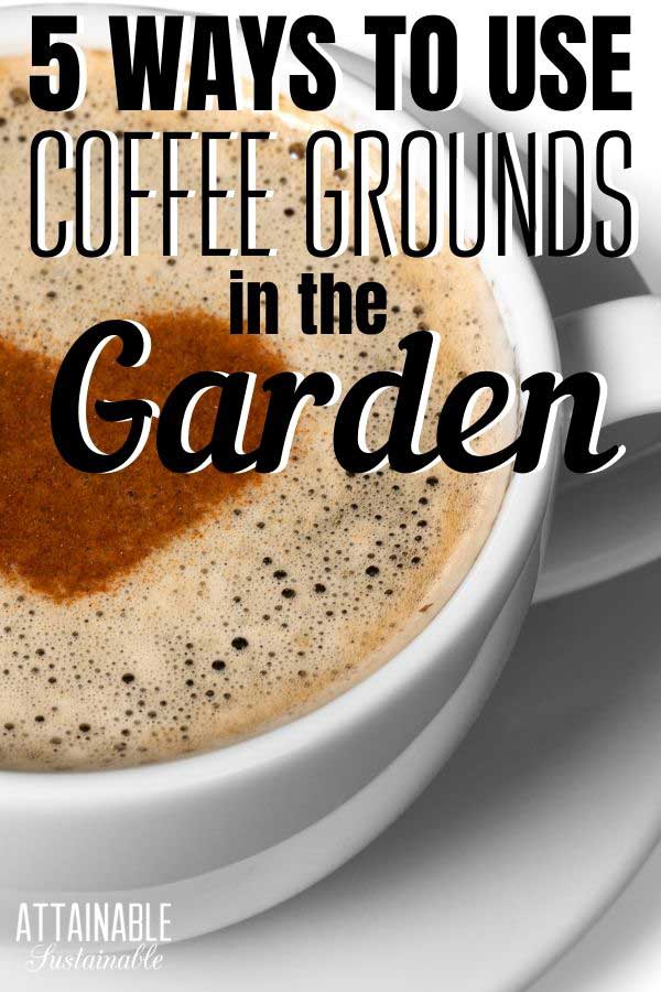 latte in a white cup with a heart design - the resulting coffee grounds are great for the garden