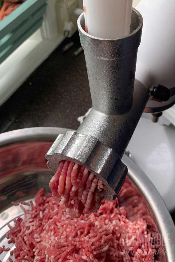 grinding pork with a meat grinder