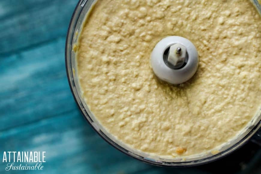 easy homemade hummus in a food processor, ready to eat.