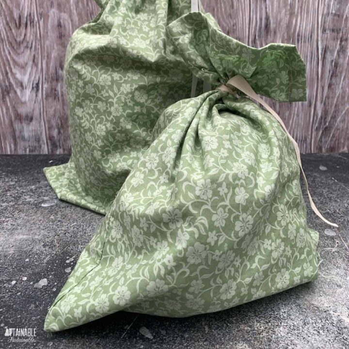 green cloth bags tied with ribbons.