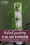 vertical tower garden in white pvc with herbs and kale