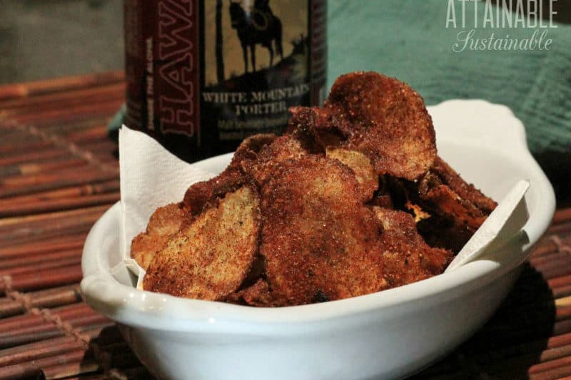 homemade barbecue chips in a white dish