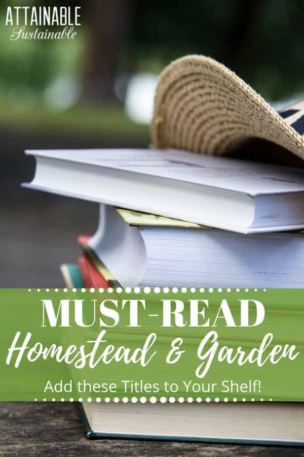 stack of books outside, with a straw hat - garden books