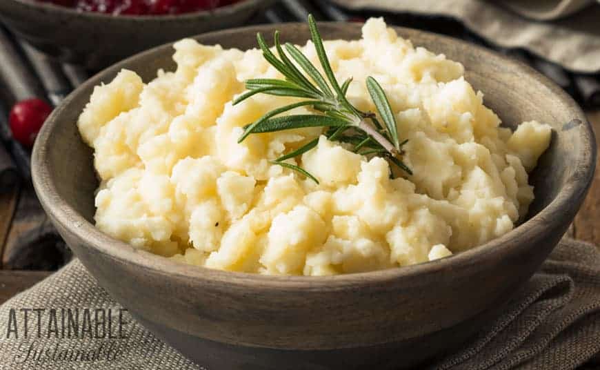 Whether you're planning Easter brunch, a Thanksgiving feast, or looking for Christmas meal ideas: No box required for these holiday dinner ideas. mashed potatoes in a brown bowl with rosemary sprig