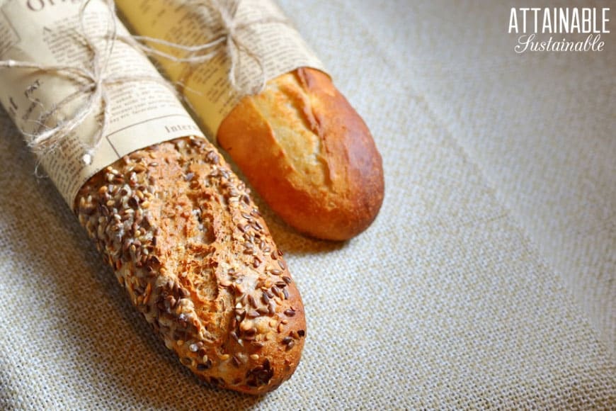 two loaves of crusty bread side by side, one with seeds (from above)