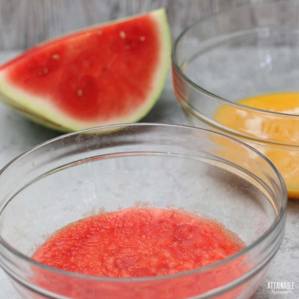 bowls of red and yellow fruit puree with gelatin sprinkled on top.