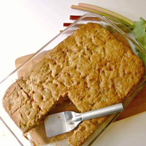 cake in pan with metal spatula