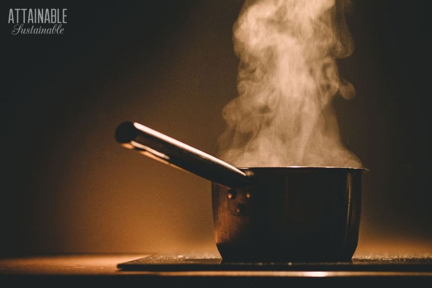 pot on a stove with steam rising - boiling water = life skills!