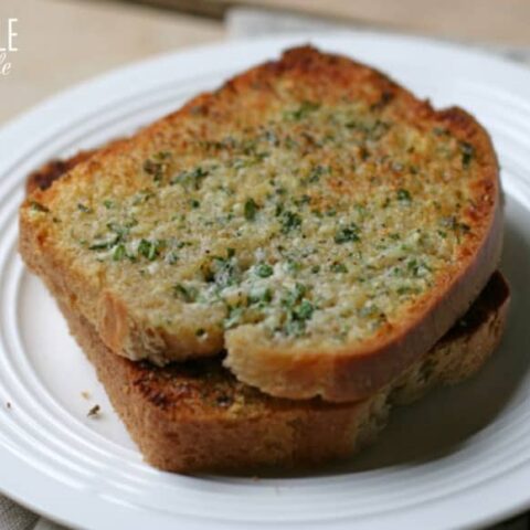 frozen garlic toast on a white plate