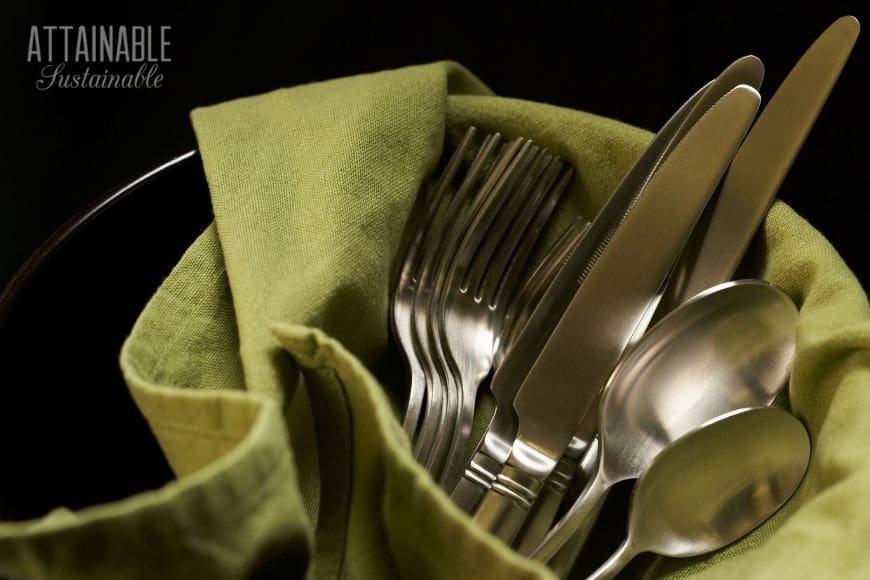 Check out these green tips for environmentally sound living! There are a lot of changes you can make - it's all about changing habits. (And these are EASY!) real silverware on green cloth napkin -- green living tips!
