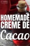 HOMEMADE creme de cacao in a glass bottle with a cork