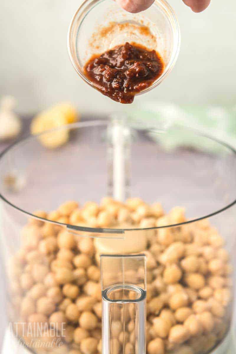 chipotle pepper dumping into food processor