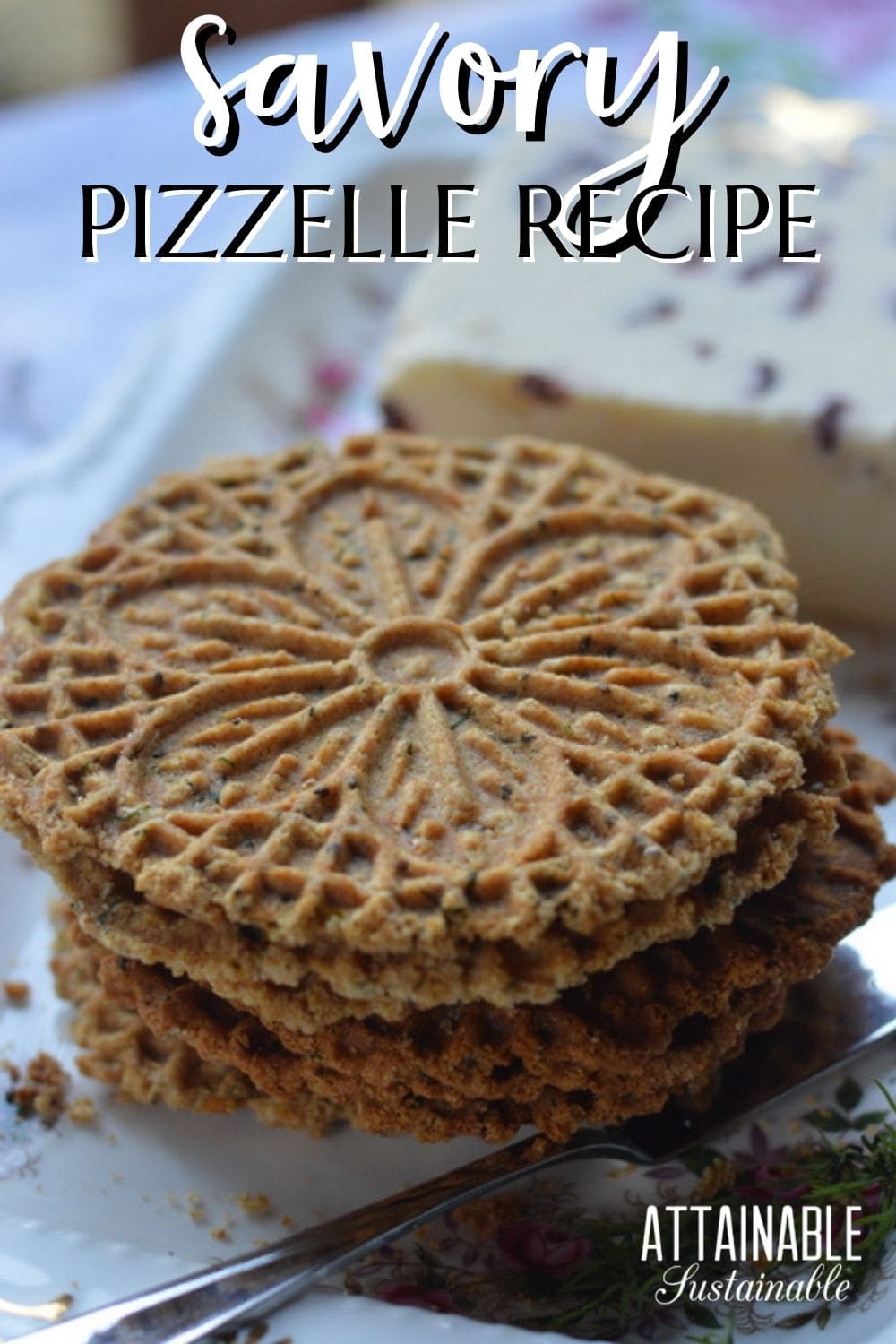 pizzelle recipe made and plated on a floral plate.