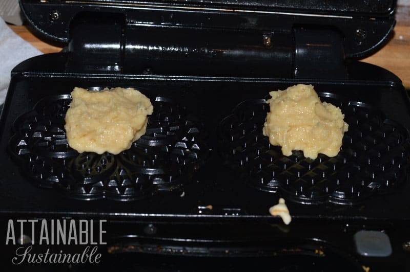 dough in black pizzelle iron