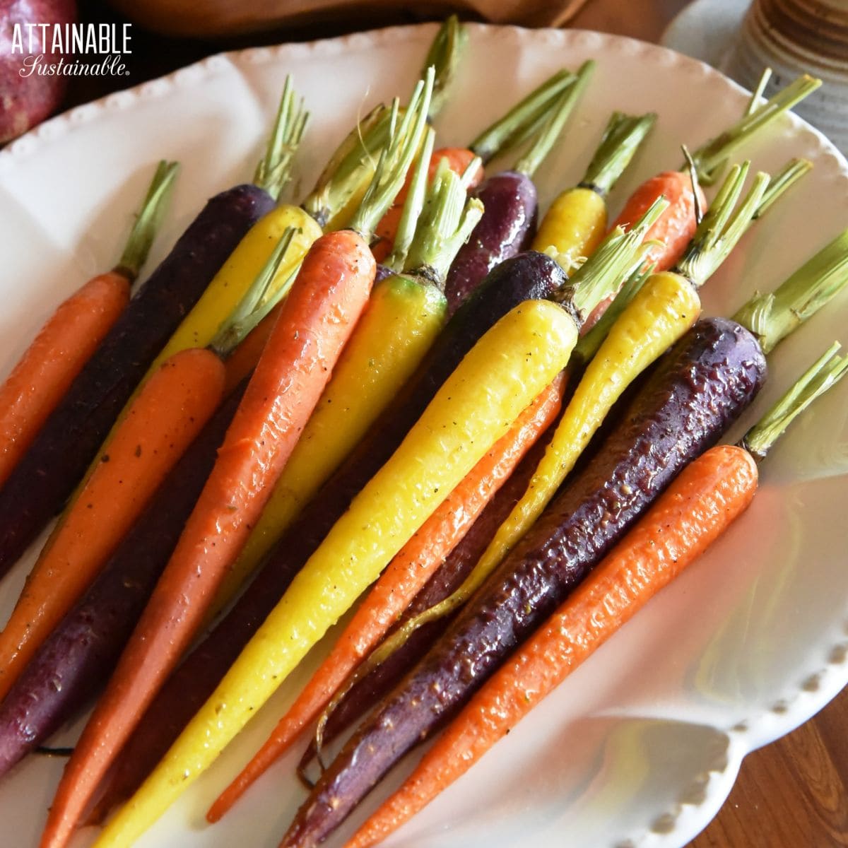 white platter with colorful roasted carrots.