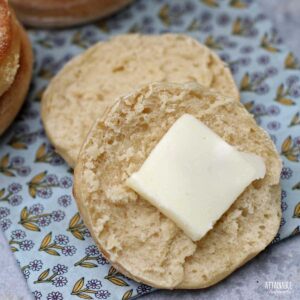 cut in half english muffin with a pat of butter.