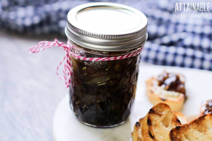 jar of onion jam with red twine bow