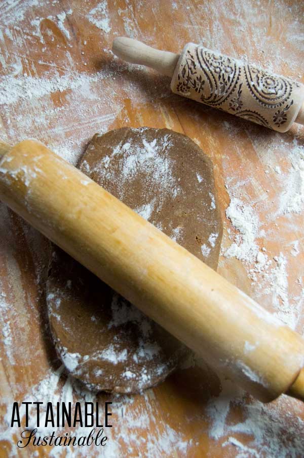 ginger cookie dough with a plain and embossed rolling pin