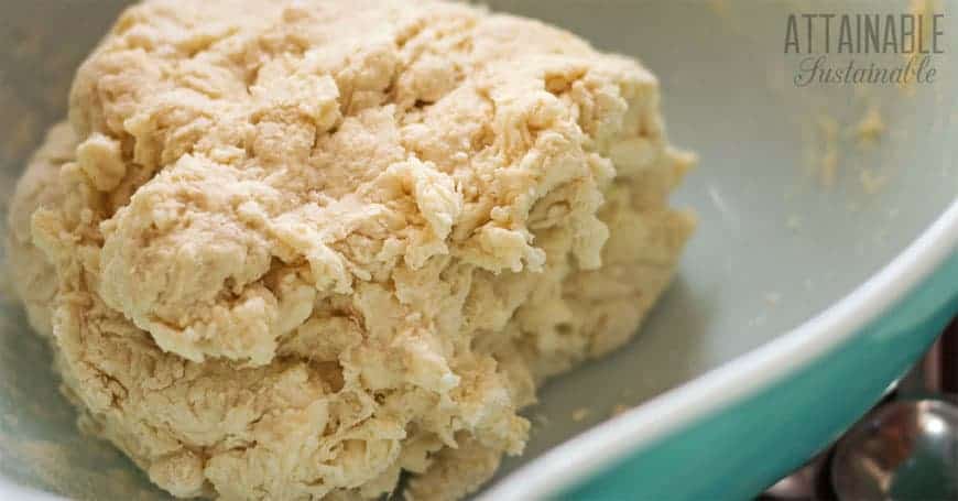 buttermilk biscuit dough in pyrex blue bowl