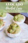 Deviled eggs with green avocado filling