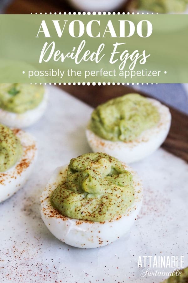 Deviled eggs with green avocado filling