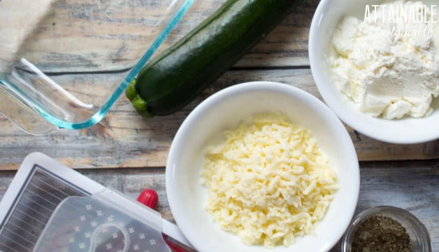 zucchini lasagna ingredients: shredded cheese, zucchini, ricotta