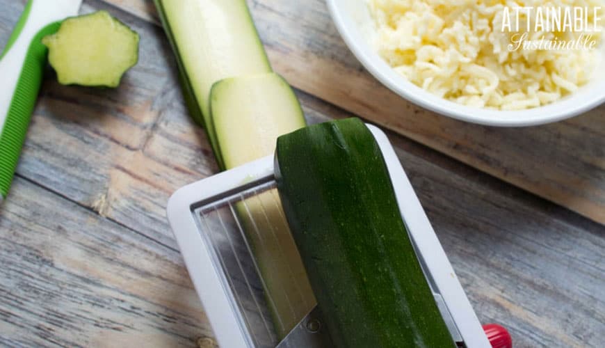 slicing zucchini with a mandoline