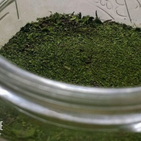 beet green powder in a glass jar
