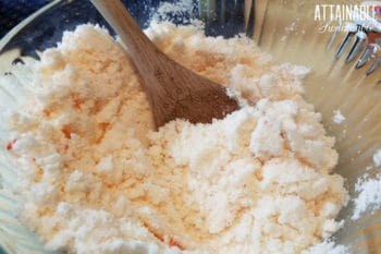 damp mixture in a glass bowl for making homemade dishwasher soap