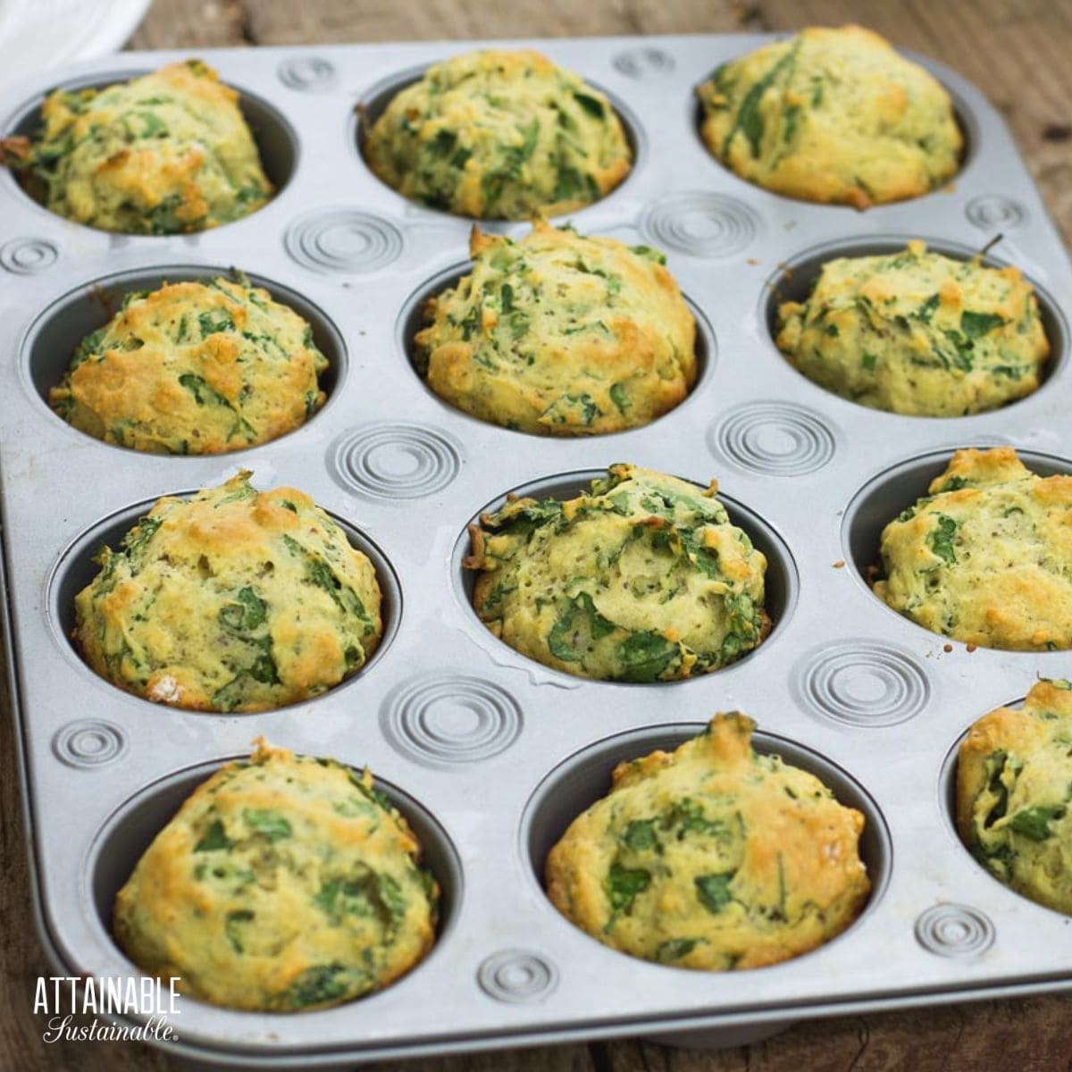 kale muffins in a muffin tin after baking.
