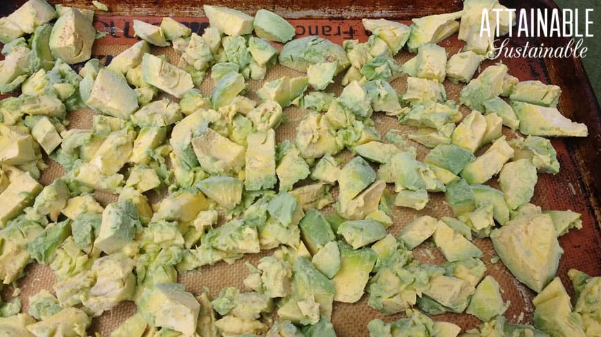 chunks of frozen avocados on a cookie sheet