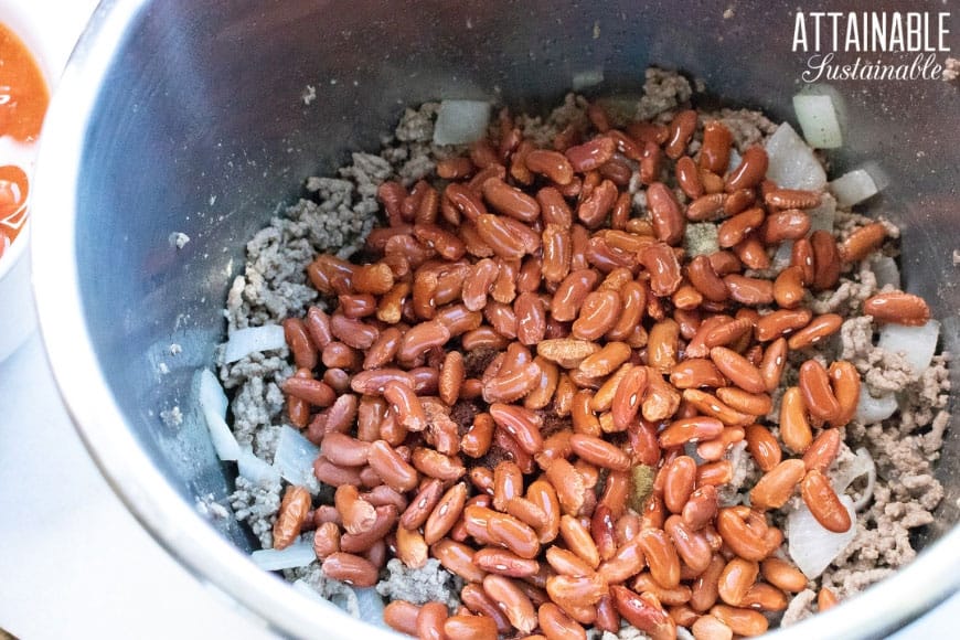 ingredients for instant pot chili, with kidney beans on top