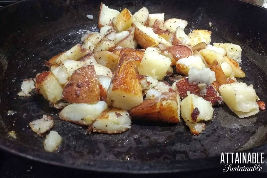 fried red potatoes in a cast iron pan