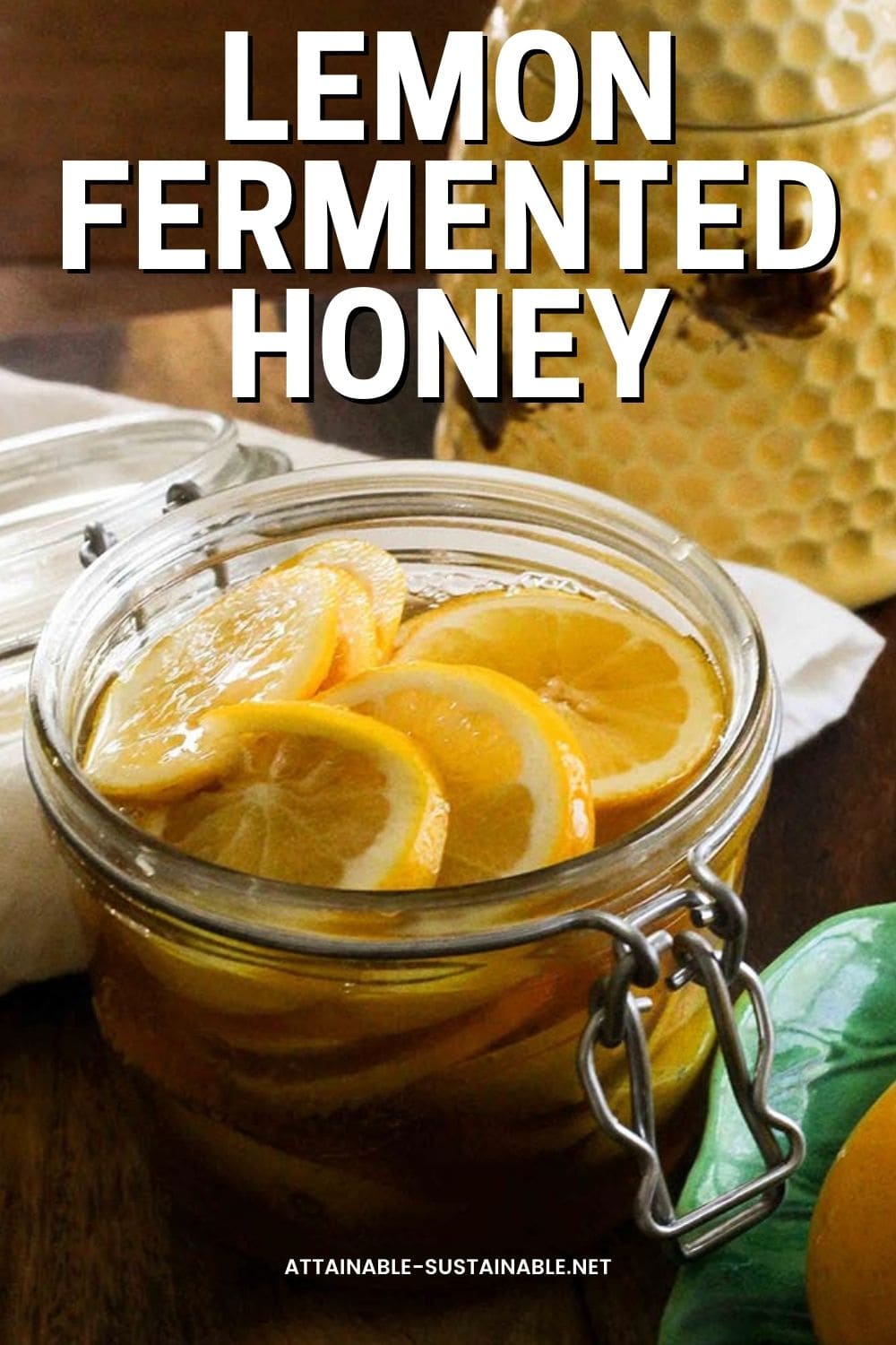 lemon fermented honey (with lemon slices) in a swing top glass jar.