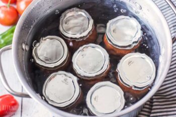 7 canning jars in a water bath canner