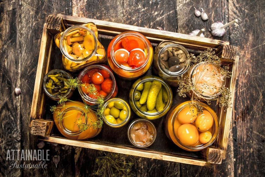 various produce in glass jars from above