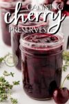 jars of cherry preserves before lids are added.