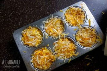 shredded carrots in a muffin tin