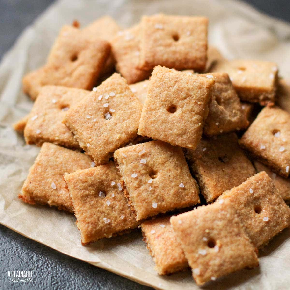 homemade cheese crackers in a pile. 