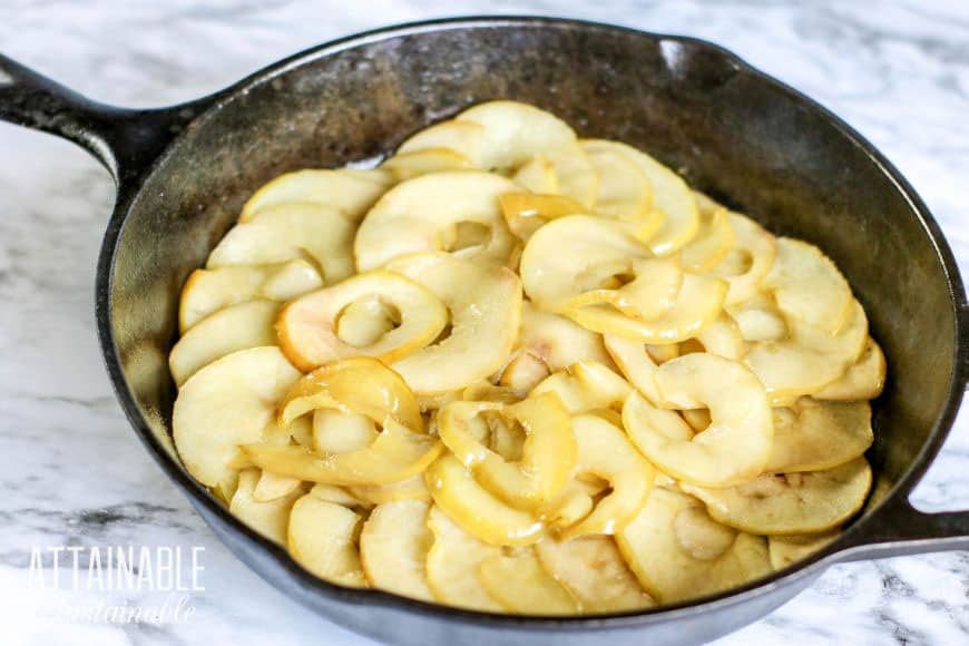 slices of apple in a cast iron pan