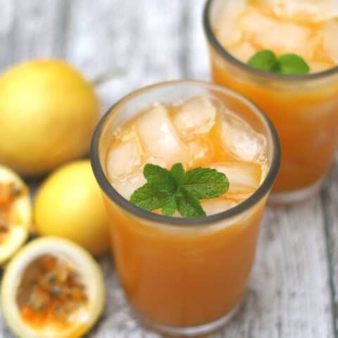 passion fruit juice in two glasses with mint