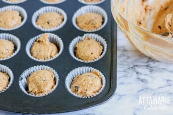 uncooked muffins in a muffin tin