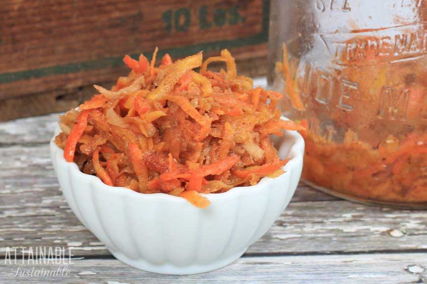 fermented carrots in a white bowl