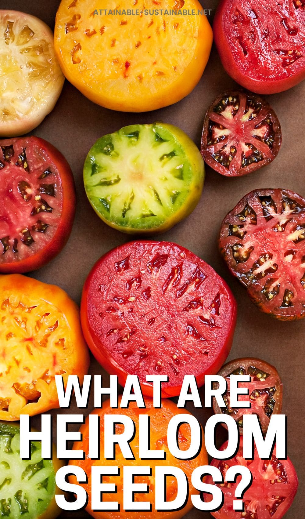 colorful heirloom tomatoes cut in half, from above.