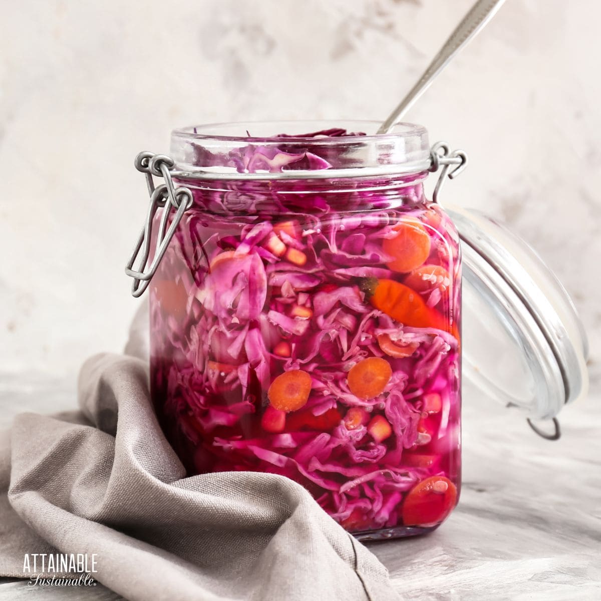 swing top jar of fermented purple cabbage.