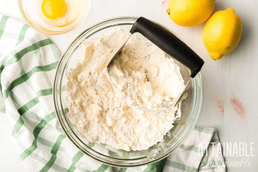 pastry cutter in a bowl of flour