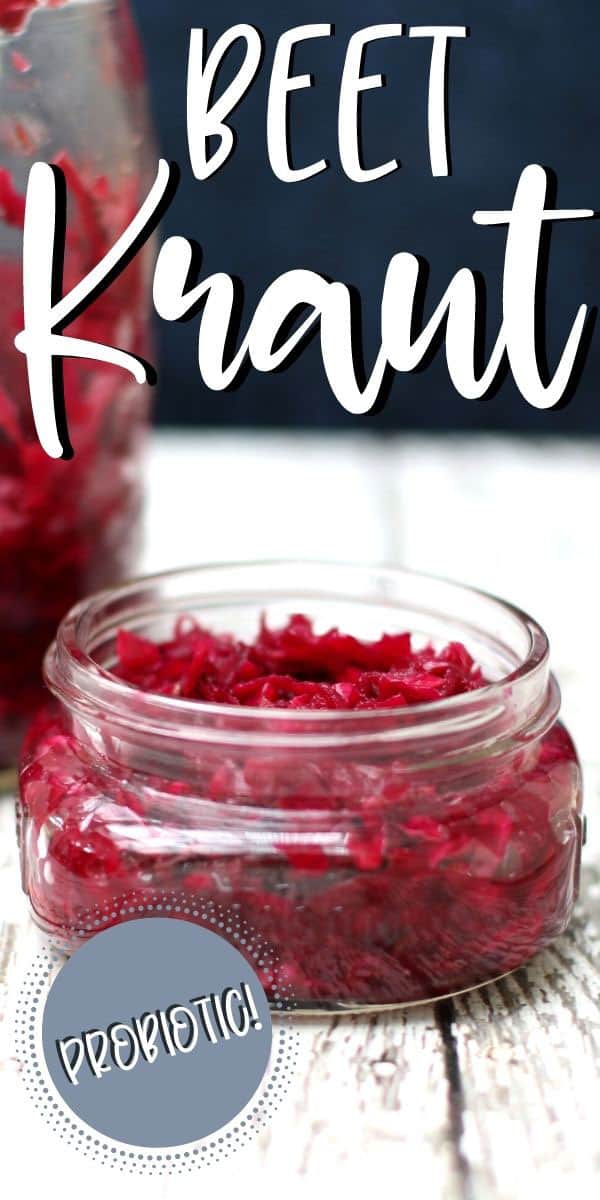 squat glass jar with bright purple beet kraut