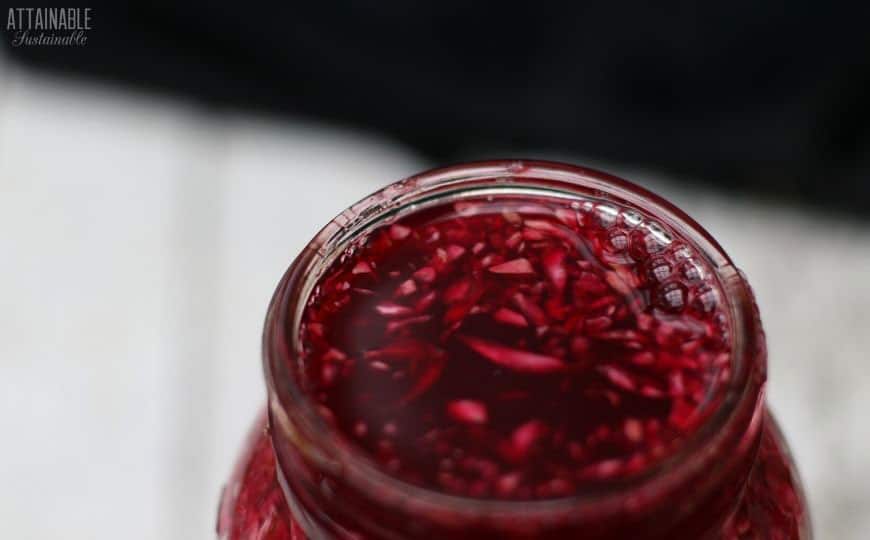 jar with red beet kraut bubbly