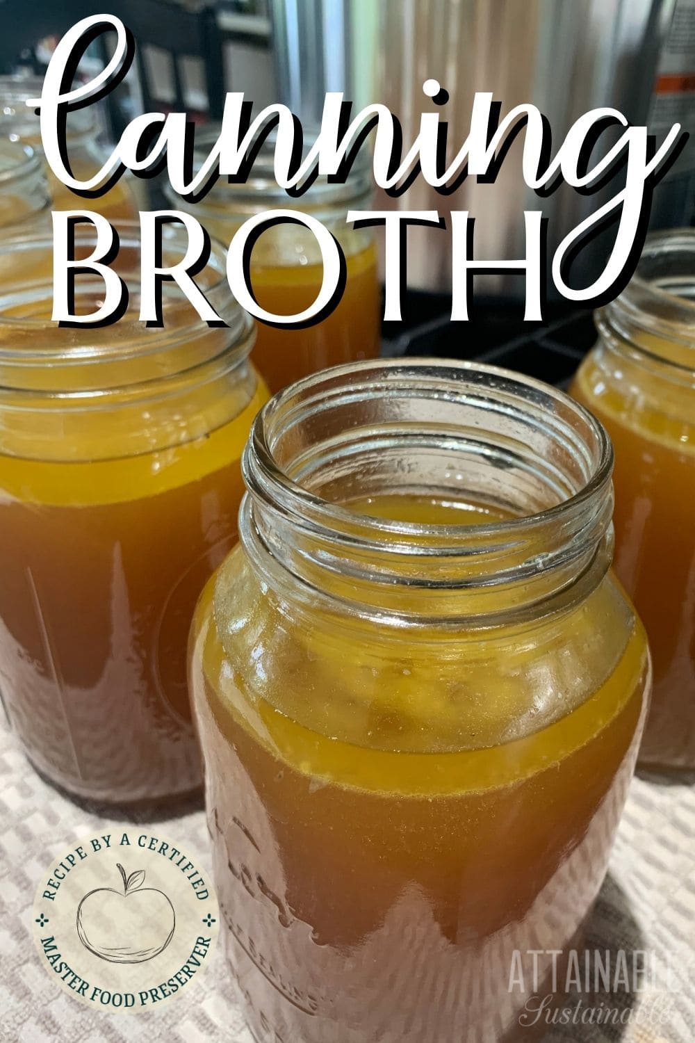 dark brown chicken broth, in jars ready for canning