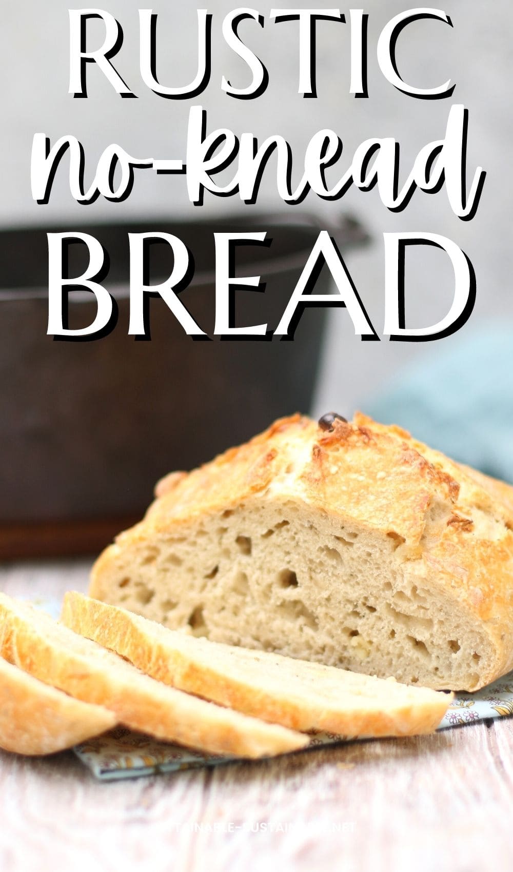 Loaf of no knead bread with several slices.